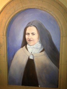 A portrait of St. Therese of the Child Jesus.