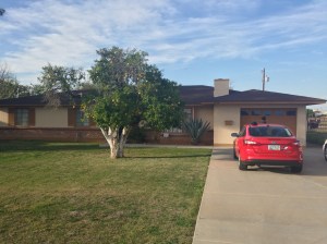 The exterior of the convent with the RSM "chili pepper" parked in the driveway.