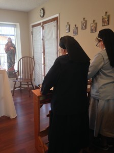 Sister Margery Therese and Sister Mary Eileen at prayers.
