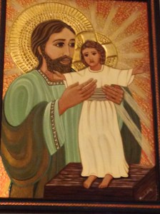 St. Joseph holding Jesus.