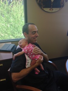 Fr. Paul Sullivan and 4-year old baby, Gianna.