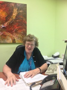 Sr. Carmel Jacobs, OSF taking requests for financial assistance.