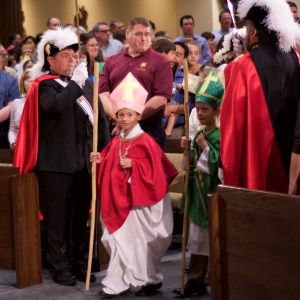 Bishop celebrated the 12:30 p.m. Mass, and some Saints were in the procession!